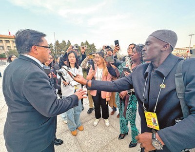 “中国全国两会向世界传递出信心与力量”（两会·读懂中国）