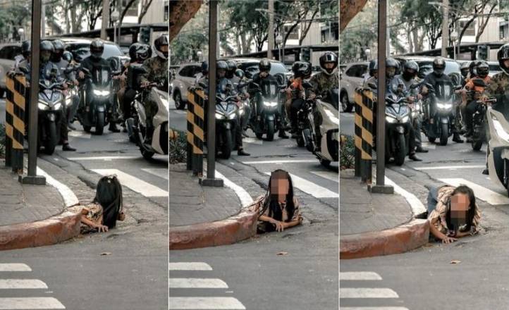 女子从菲律宾闹市排水道爬出，画面惊悚像恐怖电影