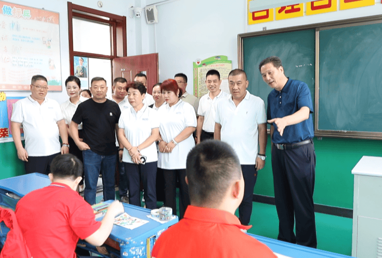 一份承诺，多年陪伴！山东德源易购商城再赴枣庄特教中心捐赠校服