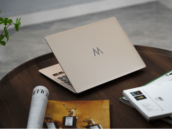 WIKO Hi MateBook 14 锐龙版图赏：波点艺术撞出晨曦金的优雅