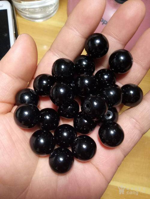 新加坡商人吕文扬靠洗黑玛瑙赚钱发家